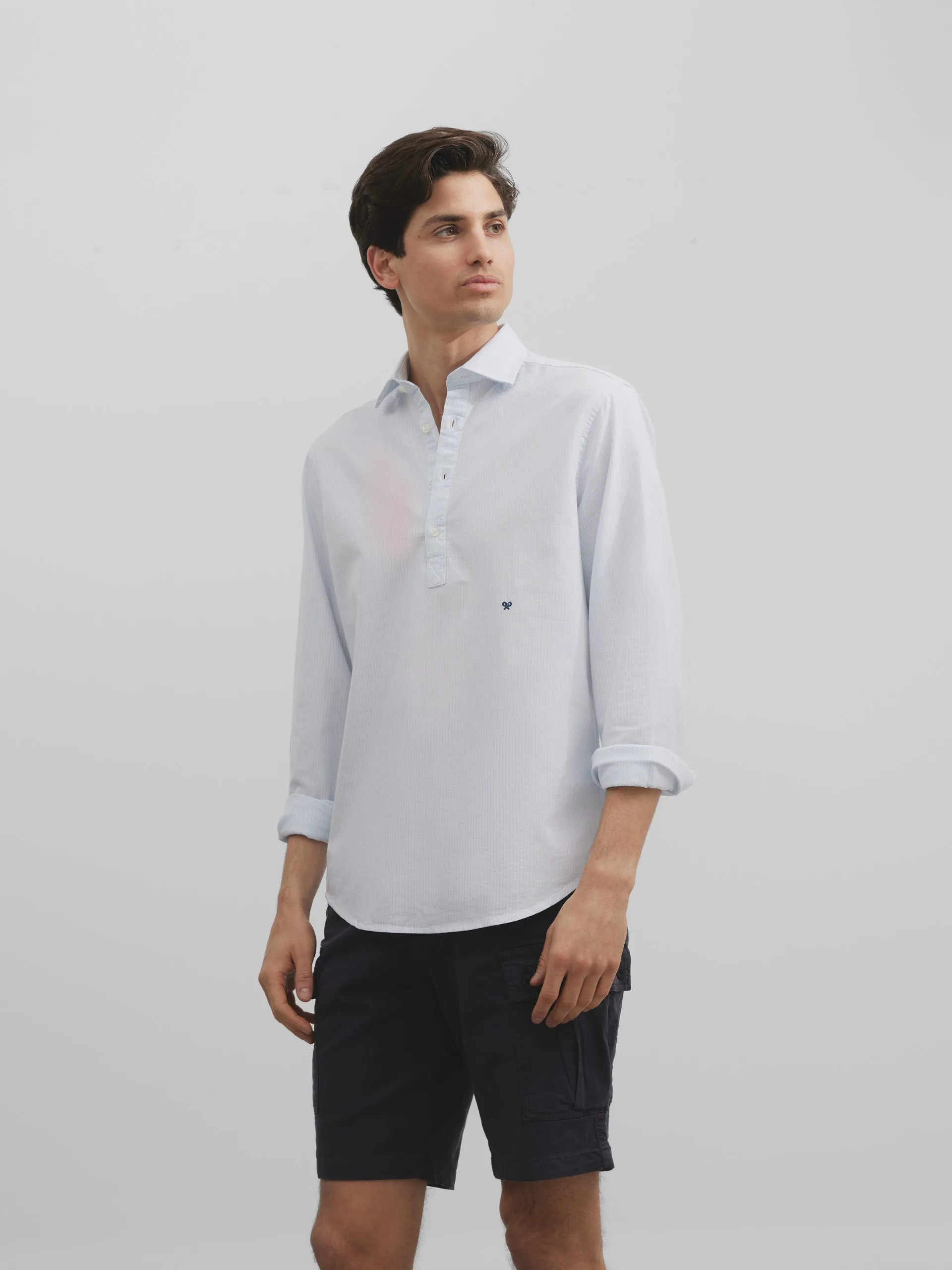 Polera sport oxford raya celeste