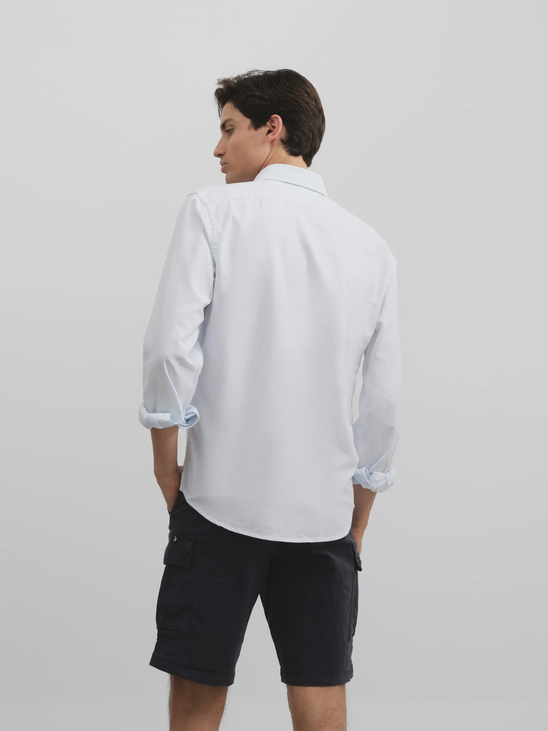 Polera sport oxford raya celeste